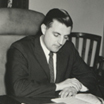 Attorney General Mondale seated at desk