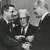 Senator Walter Mondale shaking hands with President Lyndon Johnson